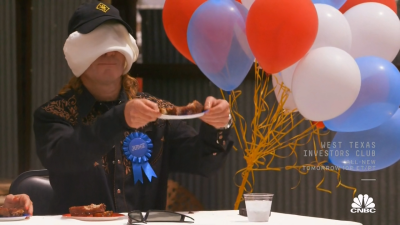 Gilliam picking Dustin's plate after nudging Jack's.