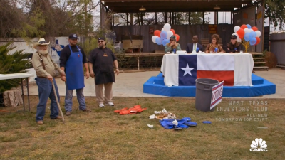 Prather displaying the sorted leftover plates.
